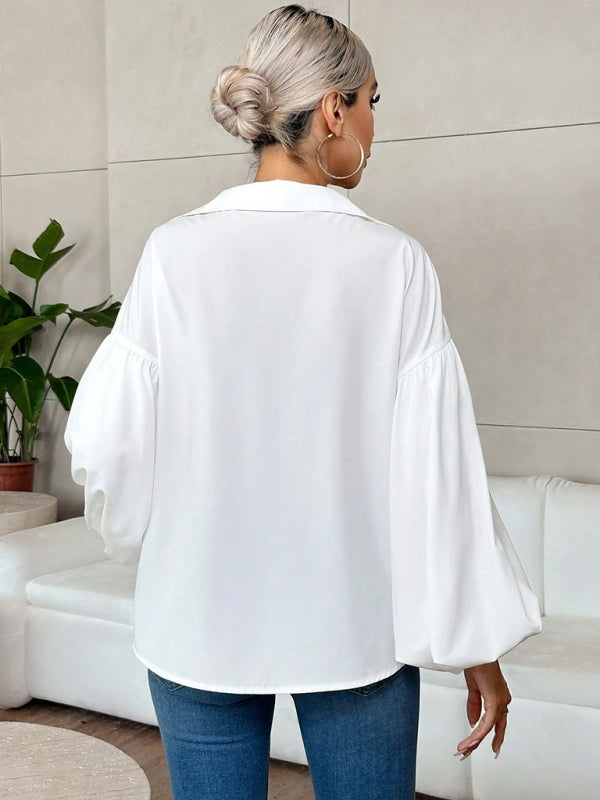 Long-fitting, puff-sleeved top with a semi-open collar