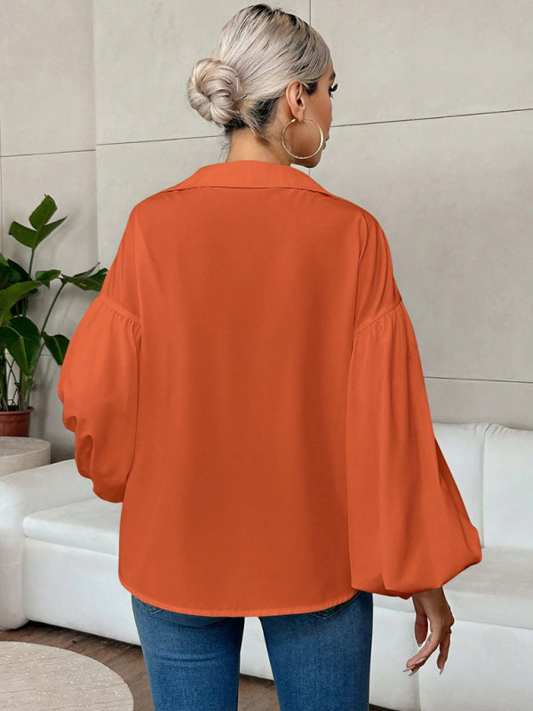 Long-fitting, puff-sleeved top with a semi-open collar
