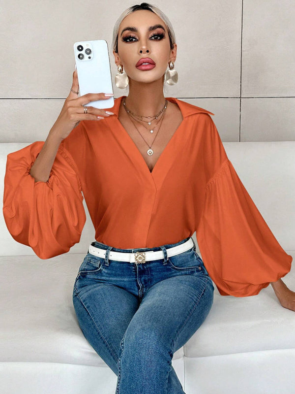 Long-fitting, puff-sleeved top with a semi-open collar